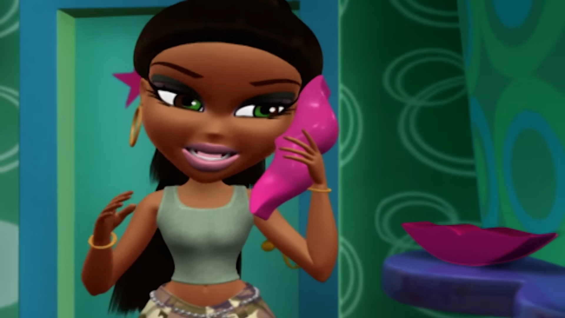 An image of Sasha using the pink lips-shaped pick-up phone. The receiver is in the shape of an upper lip and it is positioned against her face