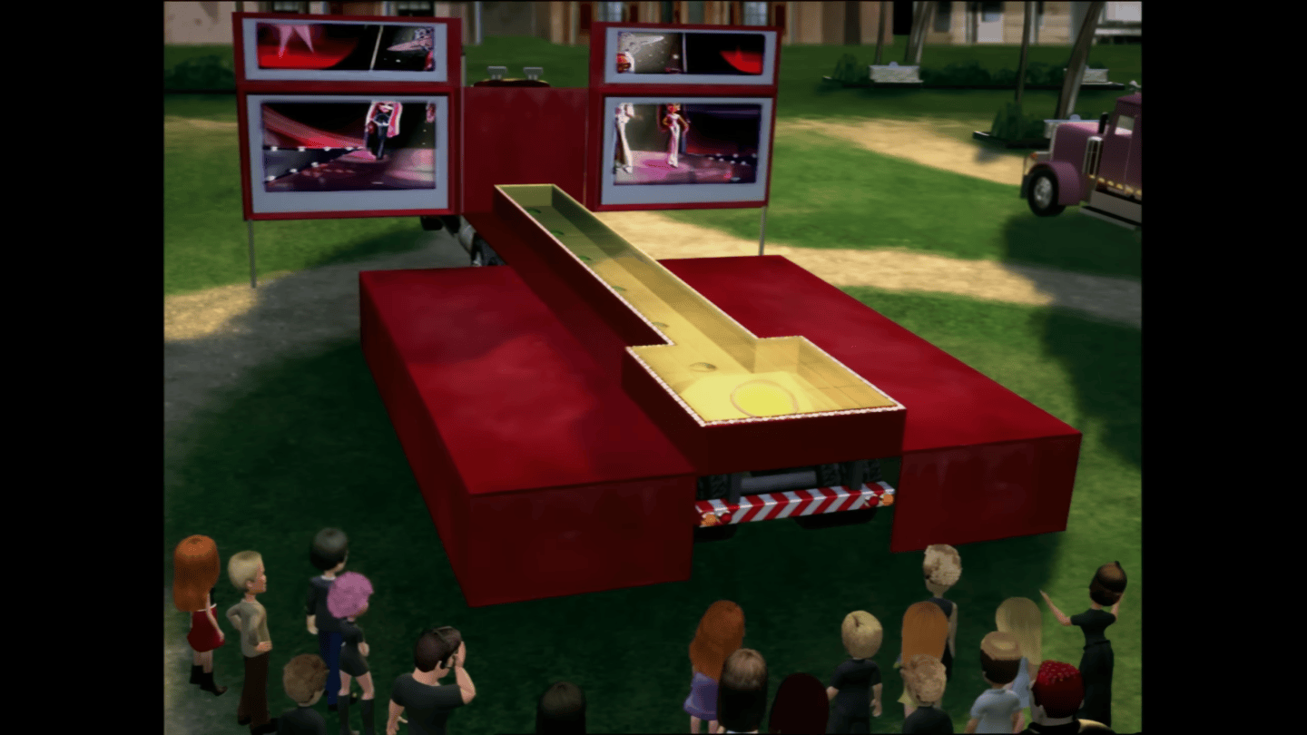 An image of the mentioned truck while its sides are folded down, revealing a T-shaped runway.