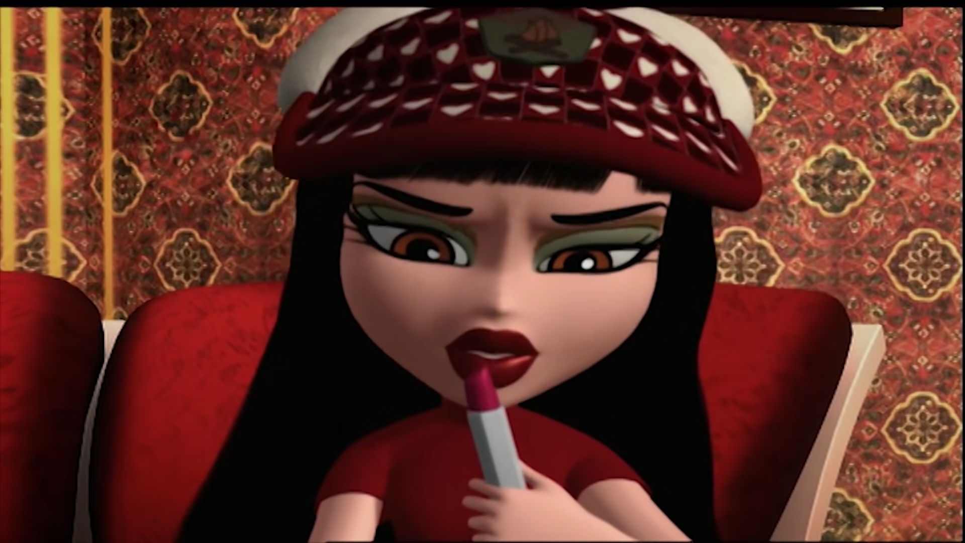 An image of Jade holding a tube of red lipstick which is actually a transmitter
