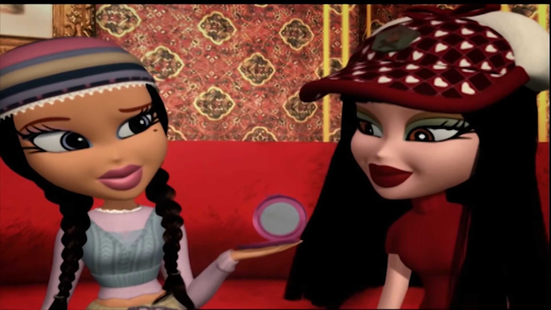 An image of Yasmine holding a pink compact which is actually a communication device. Jade is sitting next to her looking at the device.