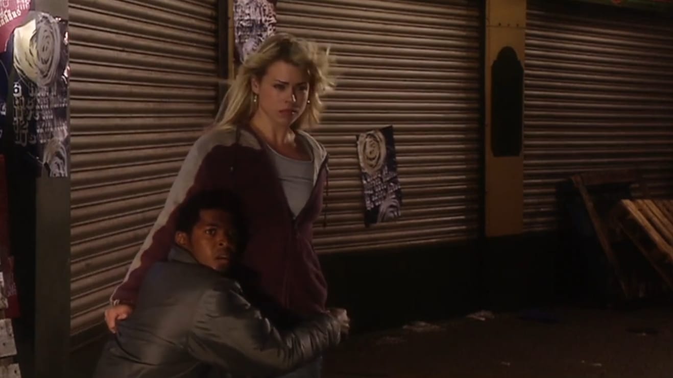 Rose with her hair blowing in the wind as her boyfriend holds onto her for dear life.